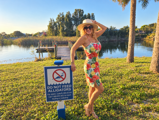 Alligator Country — Soledad Music Official Soledad Music Official by a Florida lake at sunset, next to a Do Not Feed Alligators sign